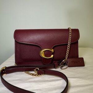 COACH Polished Pebbled Tabby Chain Clutch
Color: Merlot